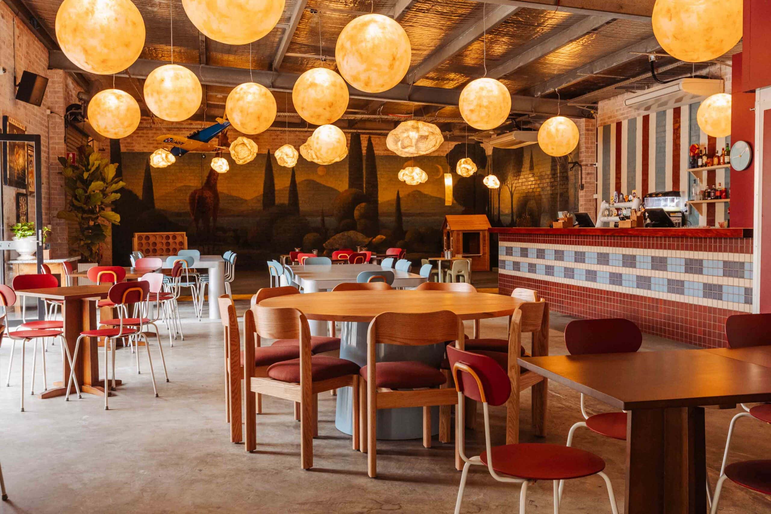 dining-bar-area-public-house-petersham-sydney.jpg Alt text: dining area and bar with pendant lights at Public House Petersham Sydney