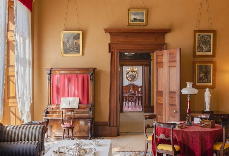 Drawing room with period furniture and piano at Elizabeth Bay House Elizabeth Bay Sydney