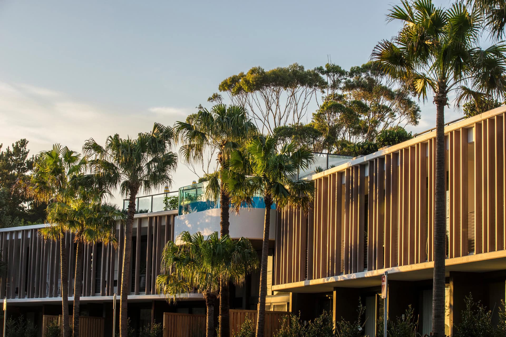 Bannisters Pavilion exterior with palm trees Mollymook