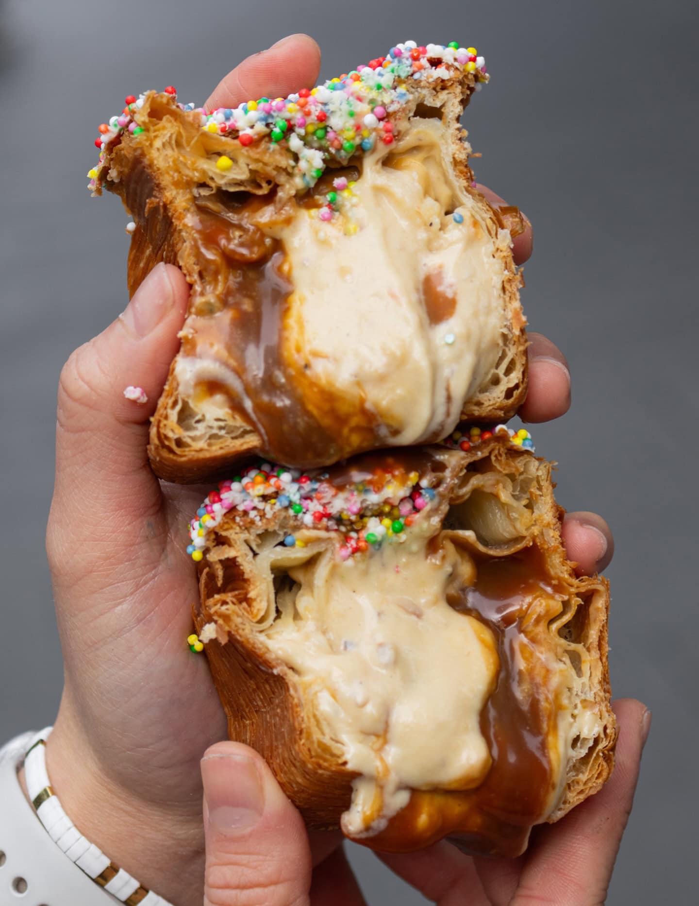 Fairy Bread Bulb pastry cross-section with popcorn ganache and salted caramel at Banksia Bakehouse Sydney CBD