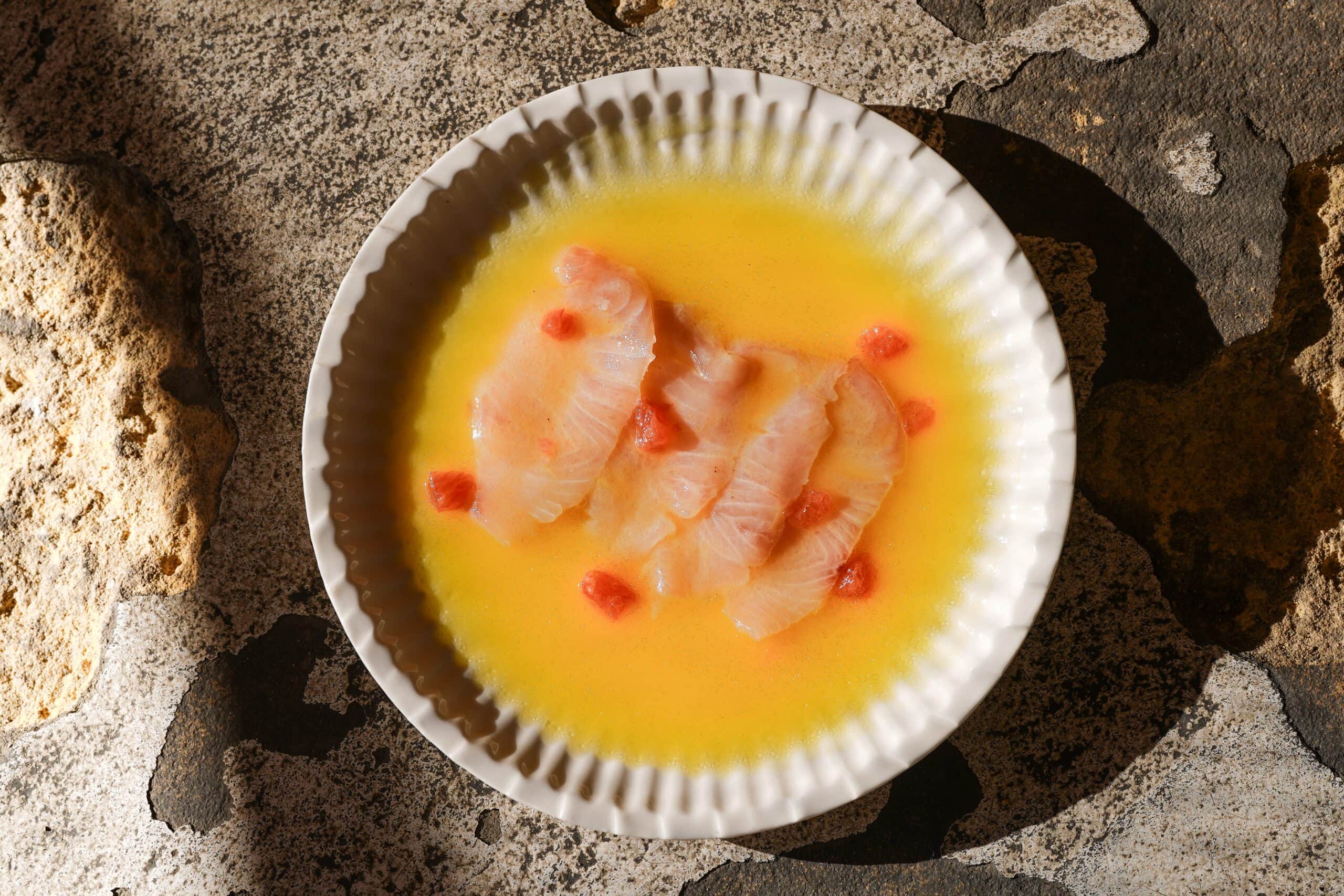 Fish crudo in citrus dressing with cherry tomatoes at Bar Elvina, Avalon, Sydney