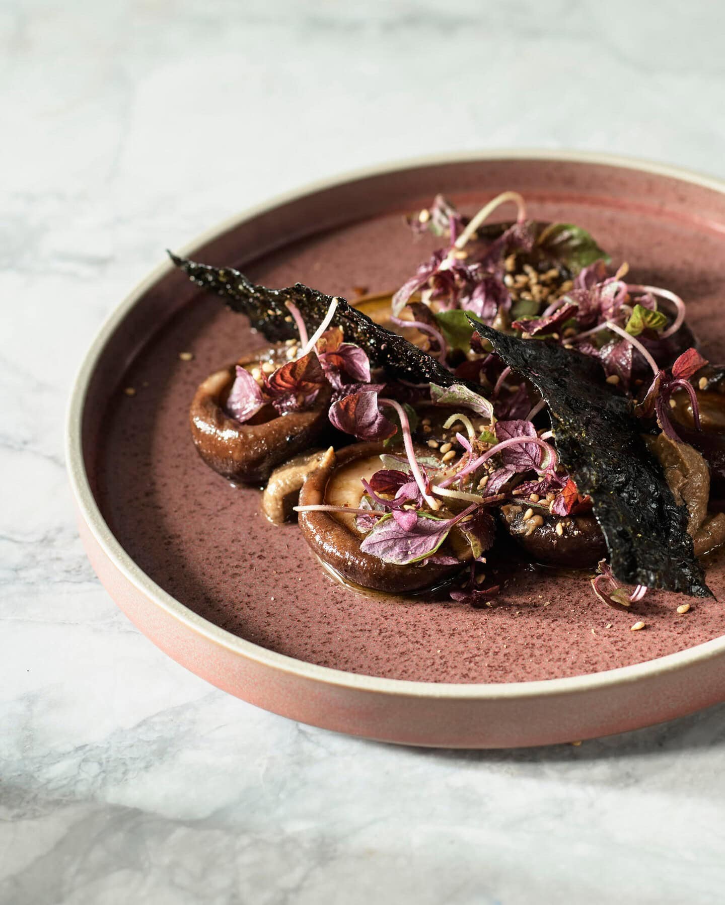 An artfully presented plate of fire-cooked mushrooms at Woodcut in Barangaroo.