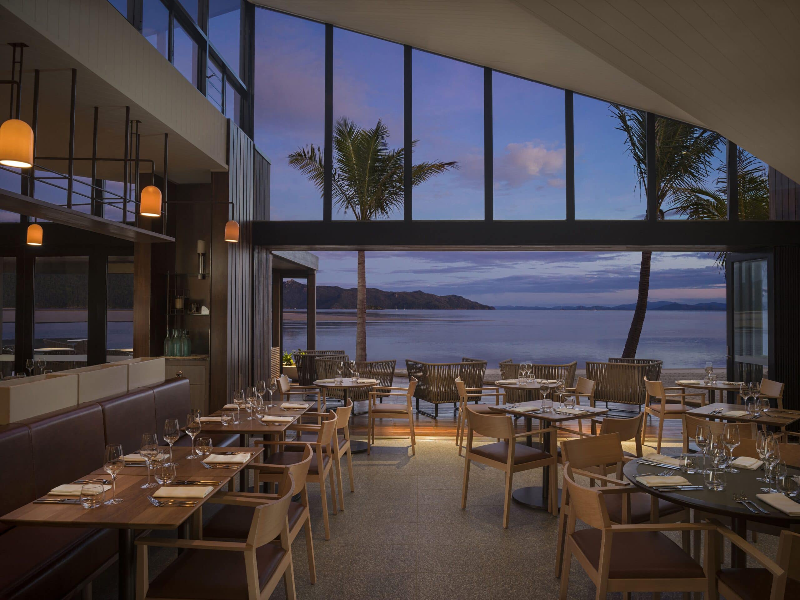 Pacific Restaurant dining terrace at sunset at InterContinental Hayman Island