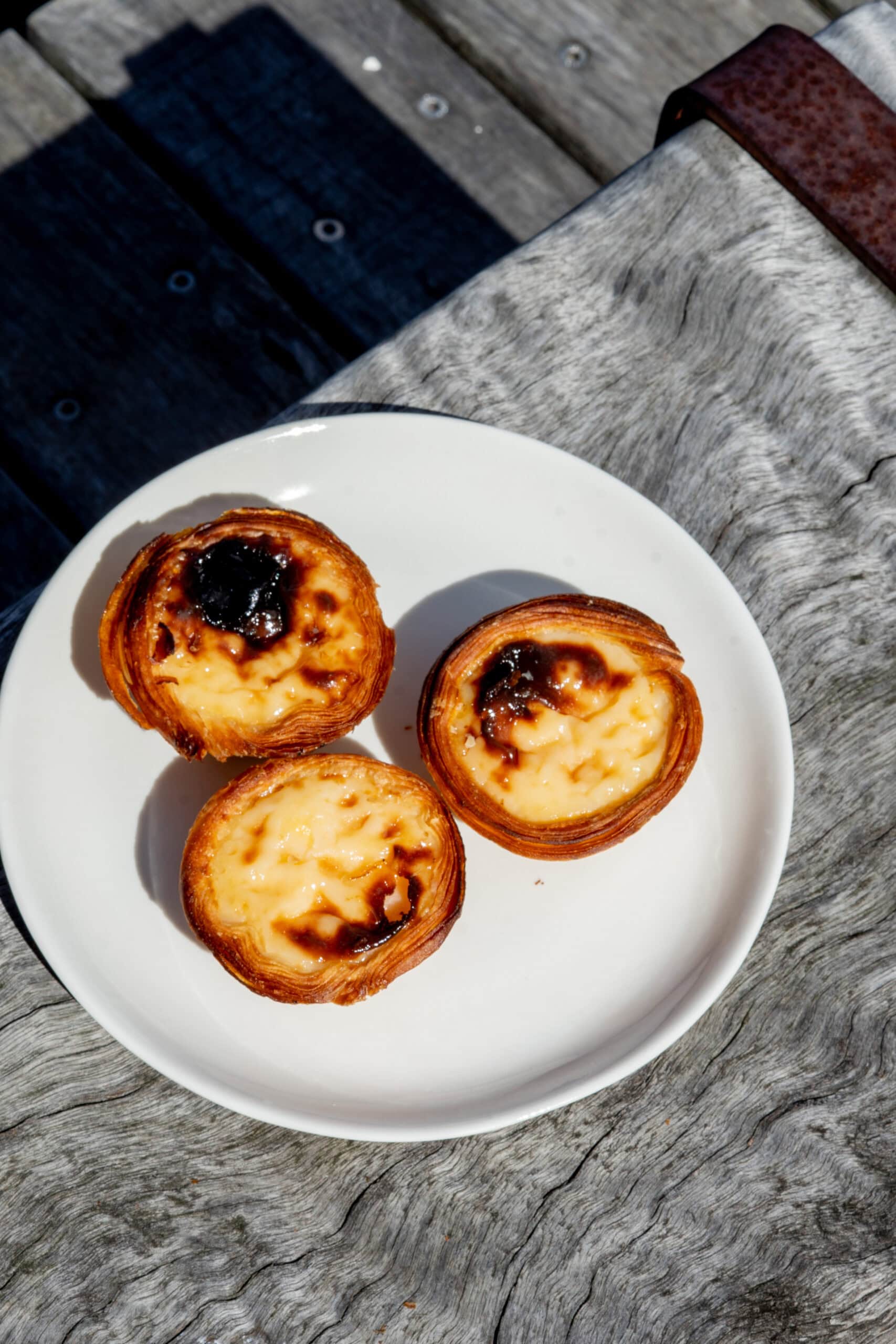 Pastel de nata Portuguese custard tarts on plate at Sweet Belem Petersham Sydney