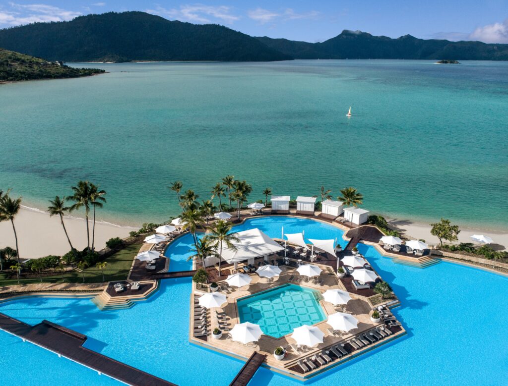 Aerial view of resort pools and beach at InterContinental Hayman Island