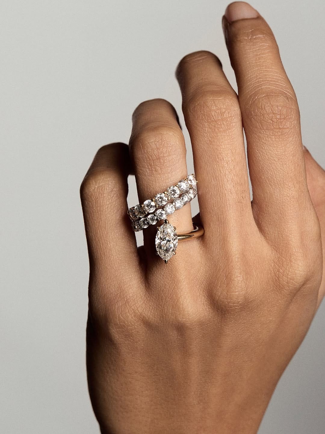A hand model with two diamond rings from natasha schweitzer on.