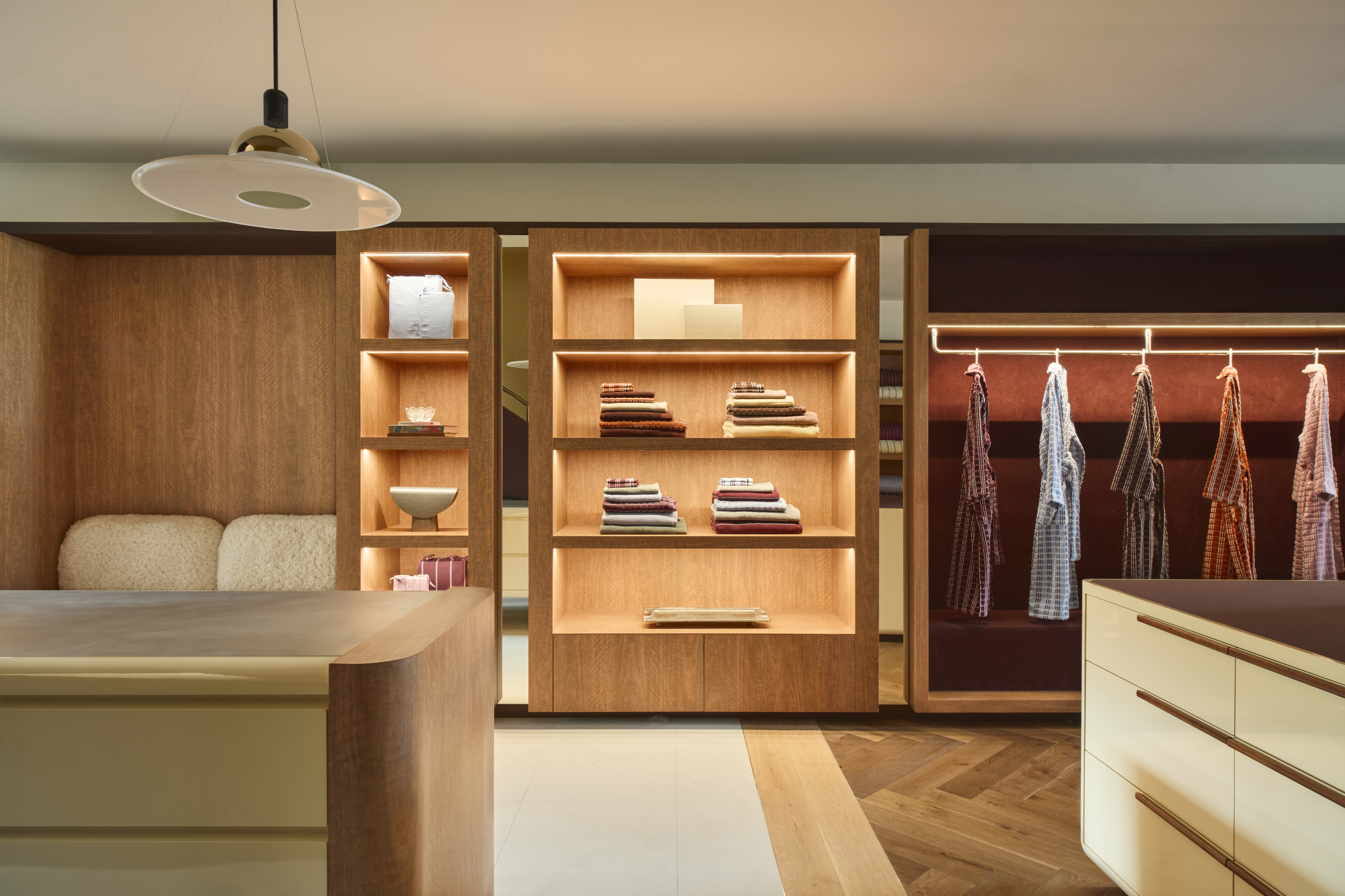 Hommey store bedroom-style display with linens, robe and bedding Paddington Sydney