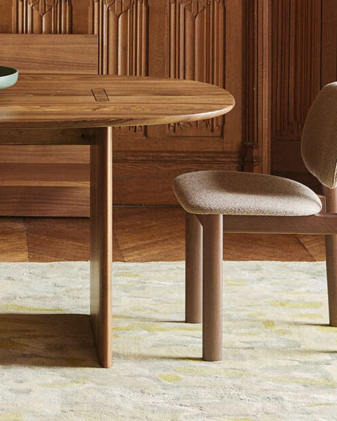 A close up of a table from Lignet Roset being sold via DOMO furniture store.