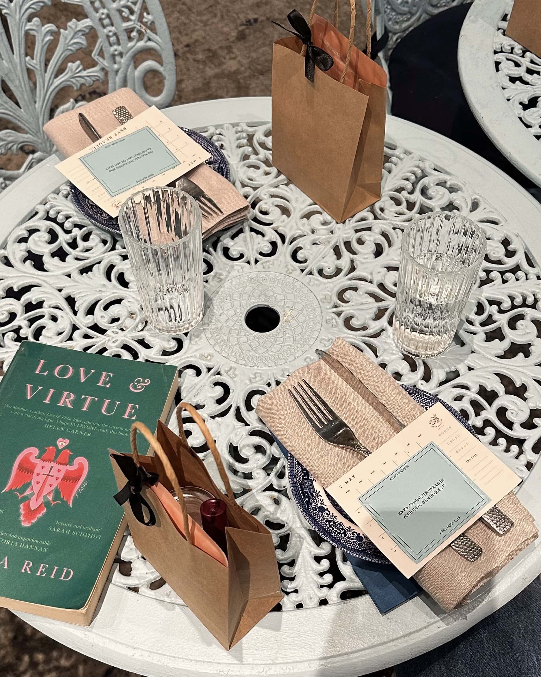 table setting with book and discussion cards at RSVP Readers book club event Sydney