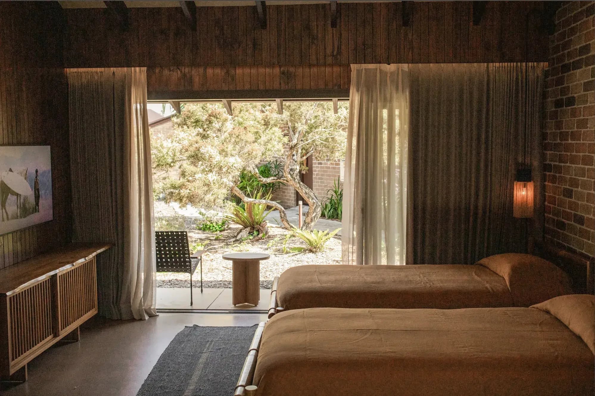 Two bedroom suite with garden view and sheer curtains at Sea Sea Hotel Crescent Head NSW