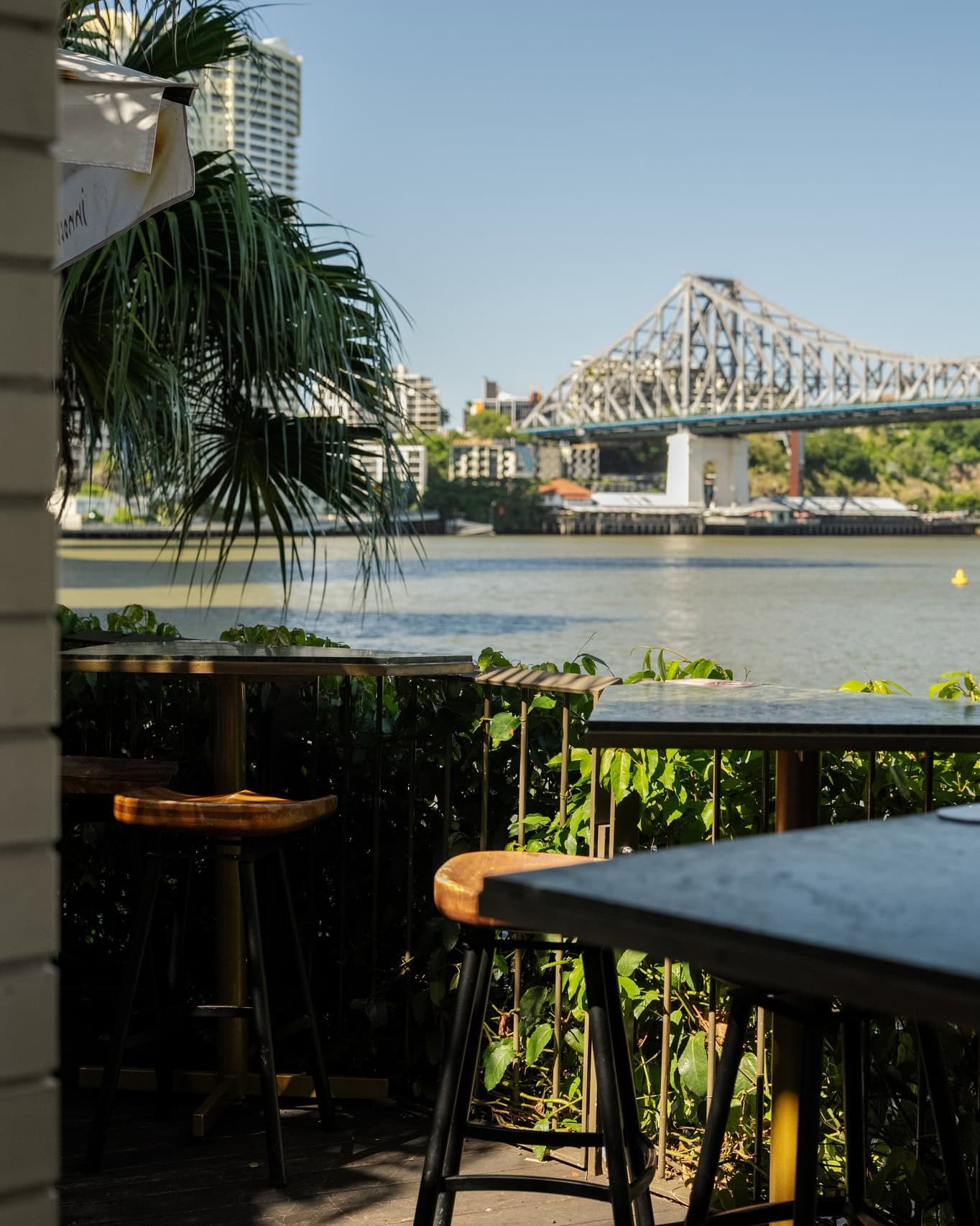 The alfresco section of Babylon in Brisbane featuring views out across the river to Story Bridge.