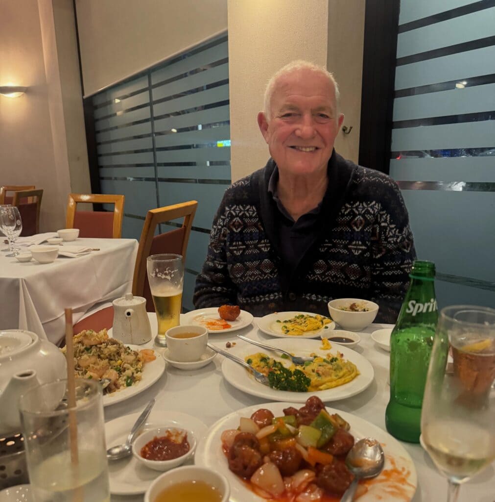 Banquet spread of Cantonese dishes including sweet and sour pork and fried rice at Peacock Gardens, Crows Nest, Sydney
