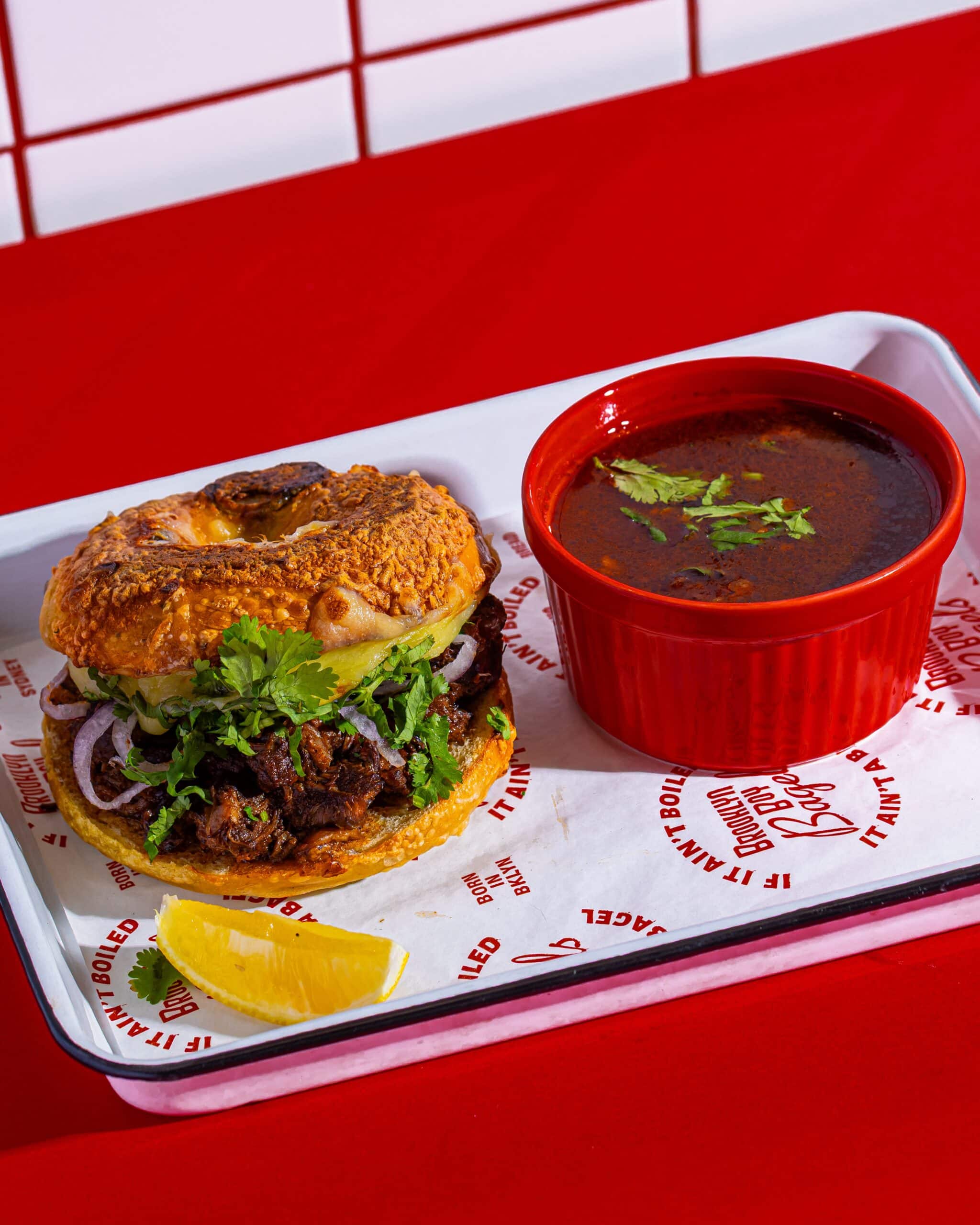 Birria bagel with beef consommé at Brooklyn Boy Bagels Marrickville Sydney