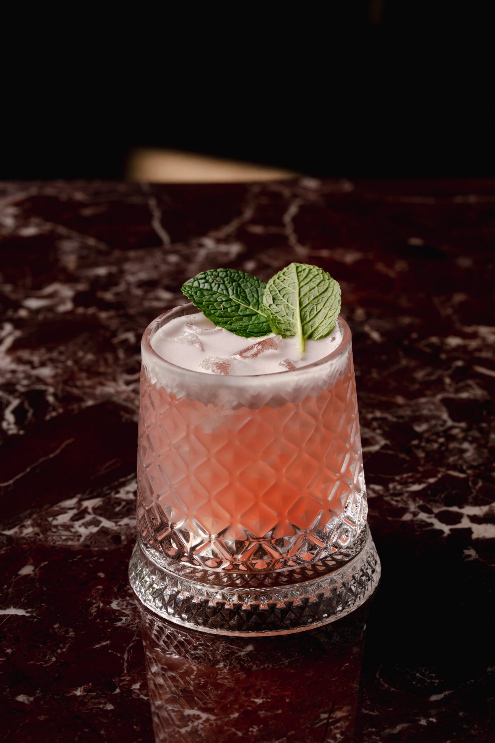 Pink cocktail with mint garnish at Zanobia Barangaroo Sydney