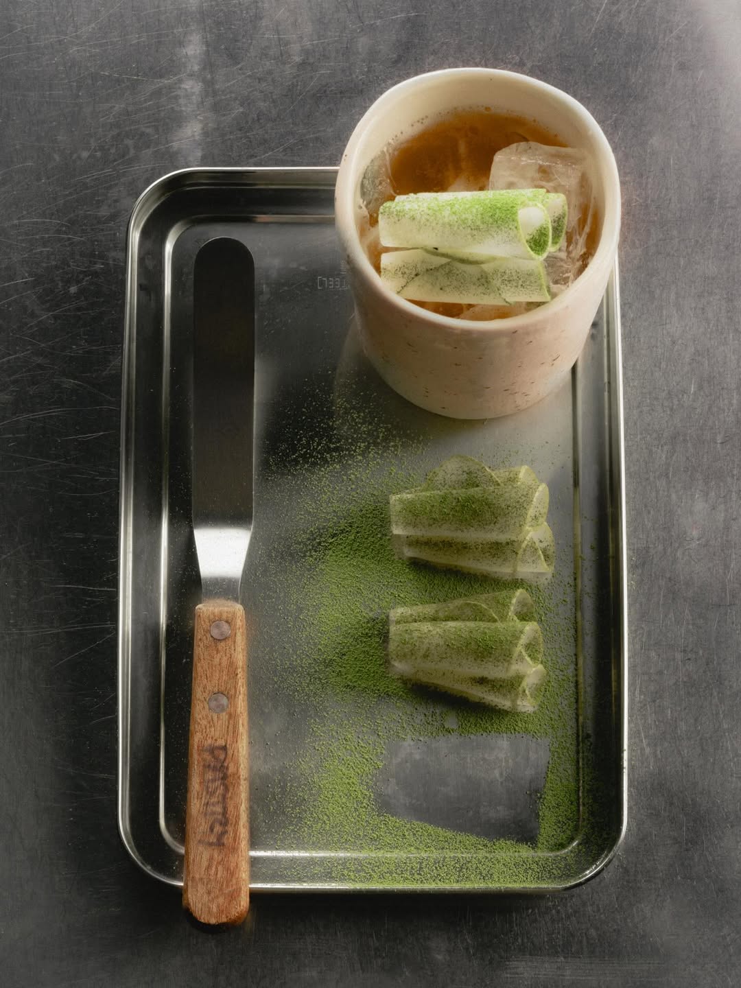 A cocktail laid out on a silver tray from Ps40 in Sydney.