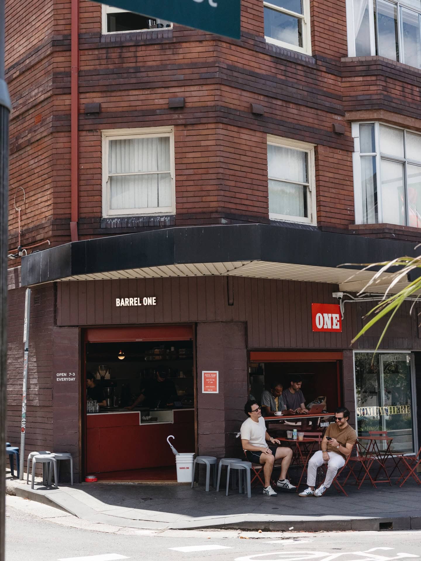 Corner shopfront with outdoor seating at Barrel One Potts Point Sydney