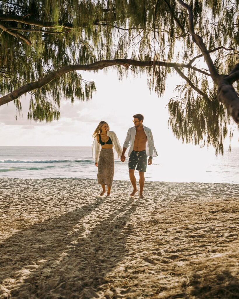Couple walking on beach in Broadbeach Gold Coast