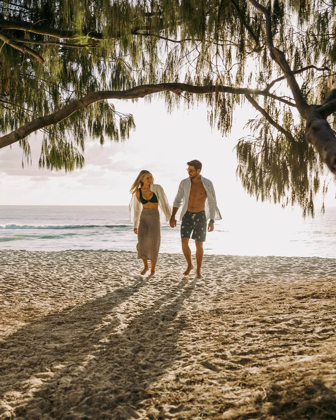 Couple walking on beach in Broadbeach Gold Coast