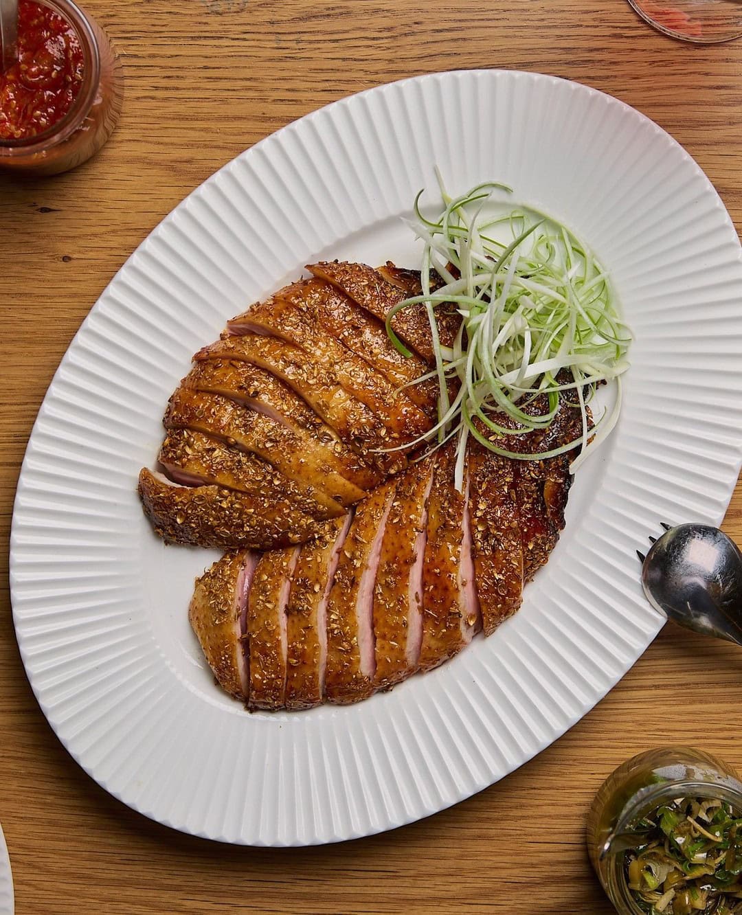 A plate of thinly sliced duck at Supernormal in Brisbane.