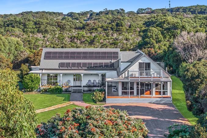 The Great Escape holiday house surrounded by lawn near Marengo Beach