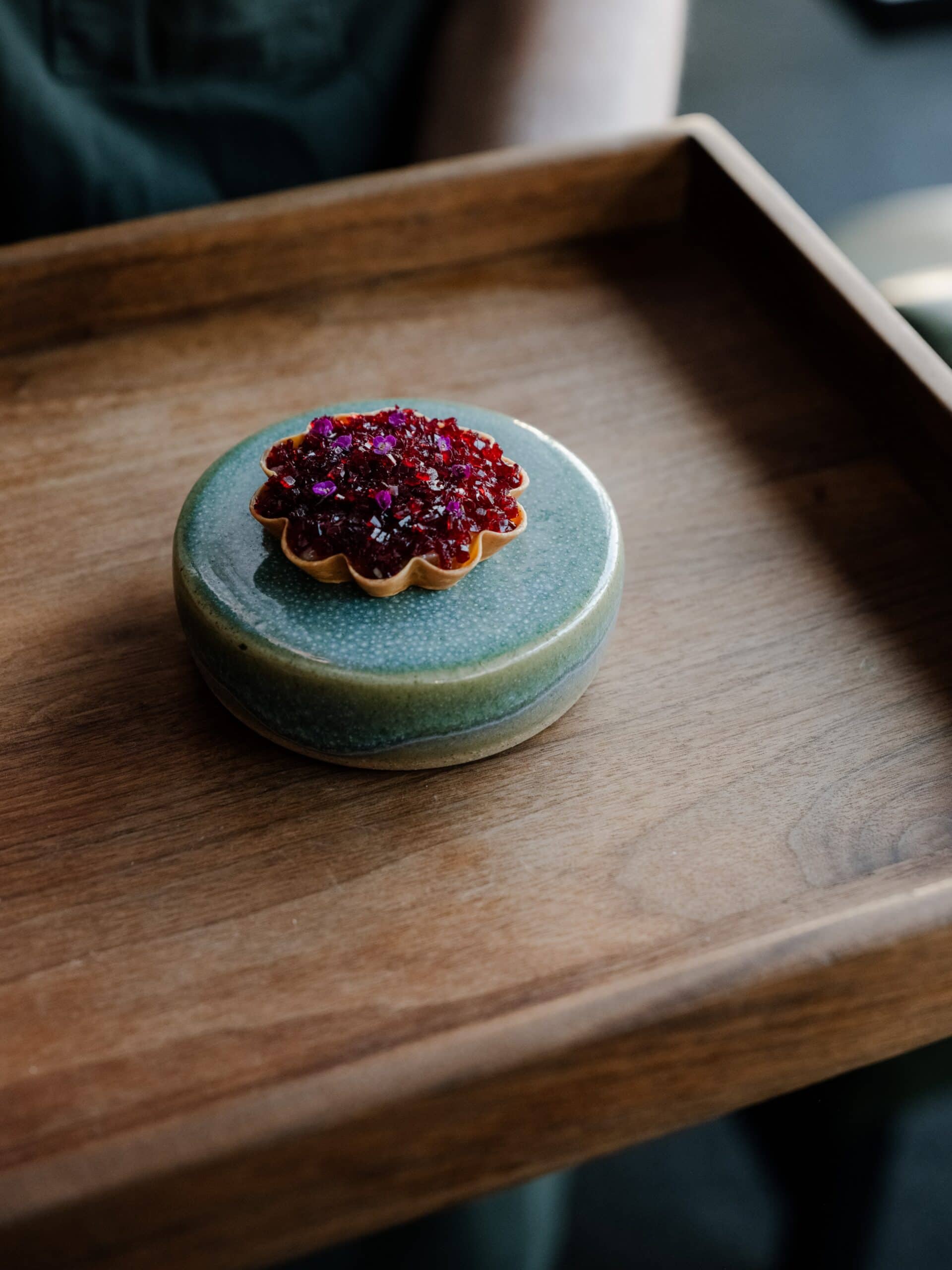 A scampi tart on a blue ceramic plate at Lumi Dining in Pyrmont.