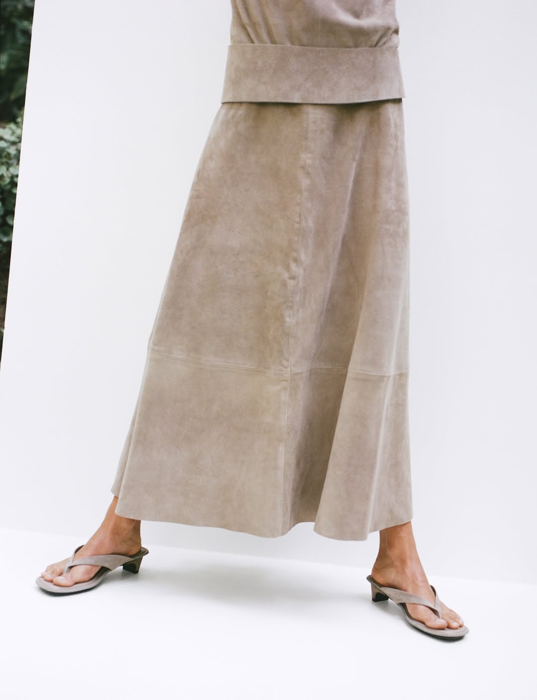 Someone wearing a suede skirt from St Agni.