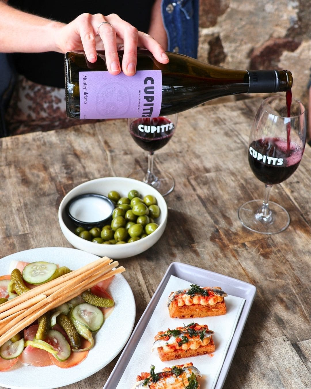 An array of wine and snacks at Cupitt's Estate in Ulladulla.