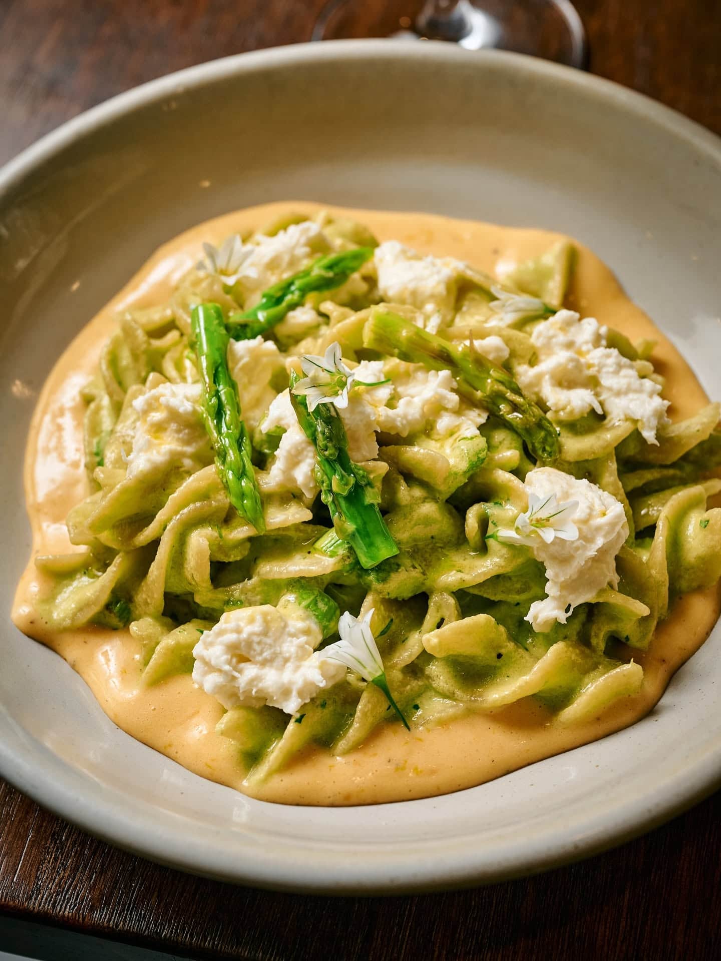 Fresh green pasta with asparagus and creamy cheese at Buono, an Italian restaurant in Parkdale, Melbourne.