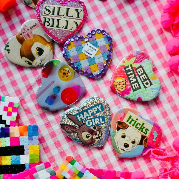 Handmade heart pins by Rachel Burke.
