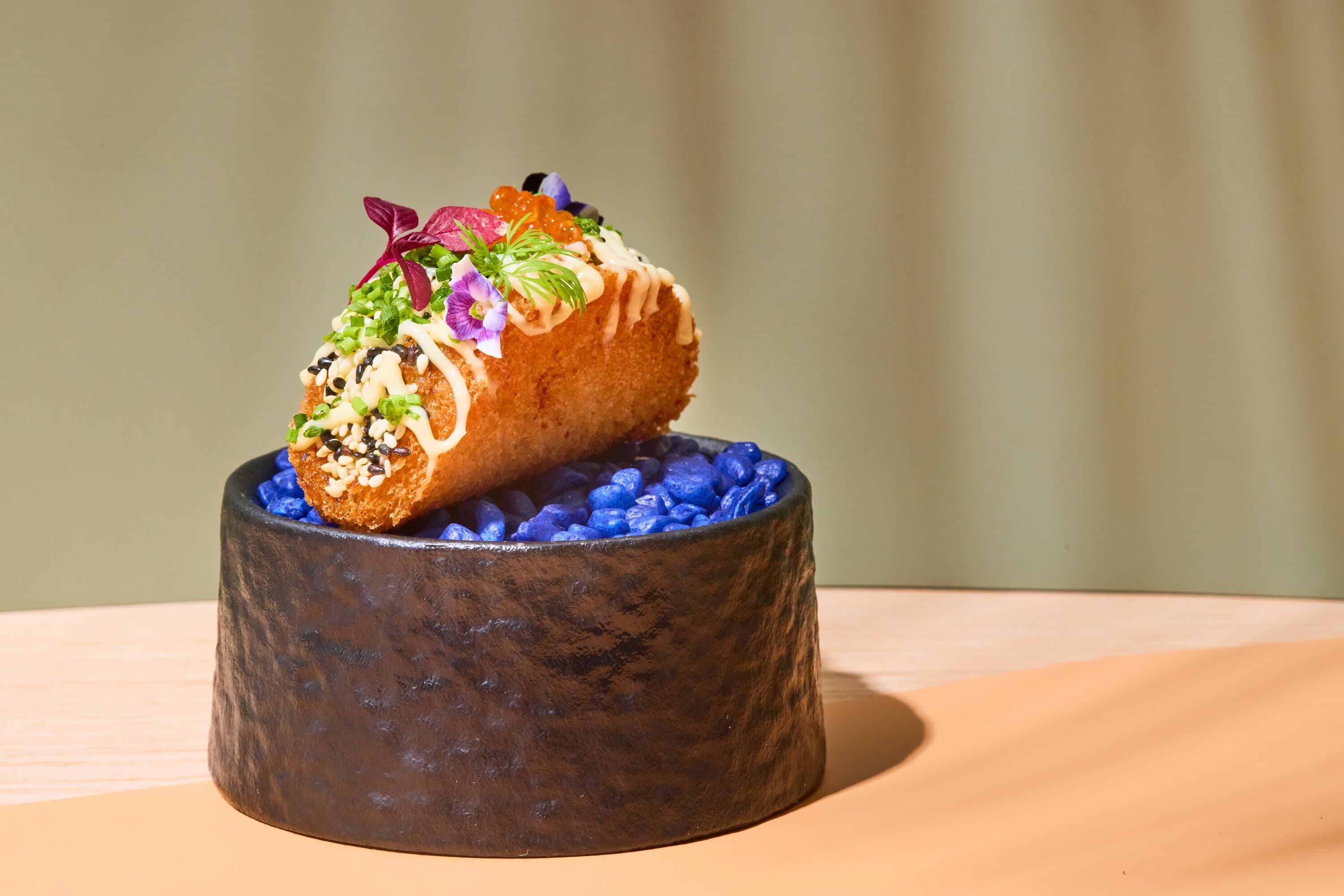 Moreton Bay bug toast topped with salmon roe, herbs and edible flowers at NOA, Cronulla, Sydney