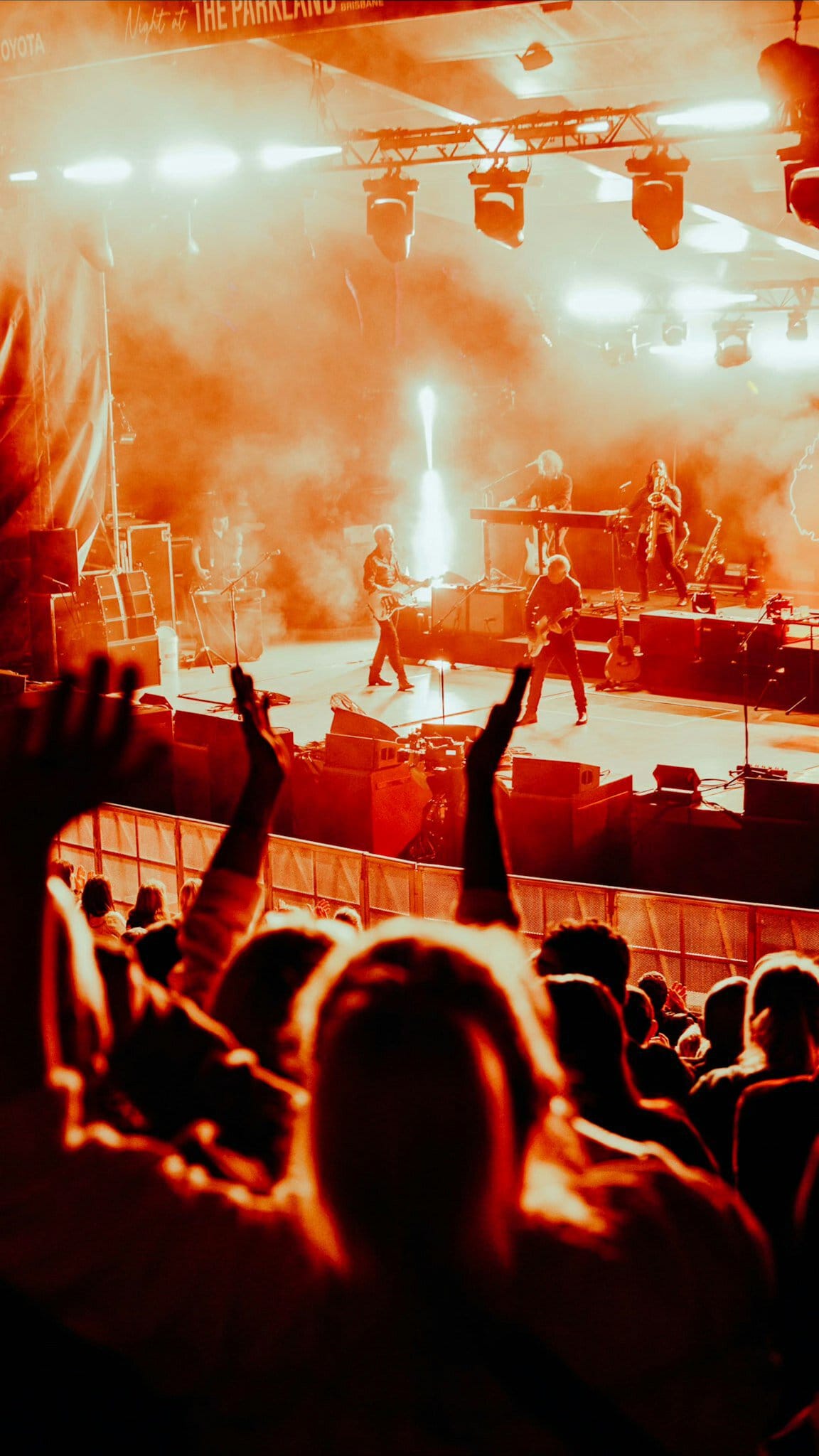 The stage with a live concert happening at Night At The Parkland in Brisbane.