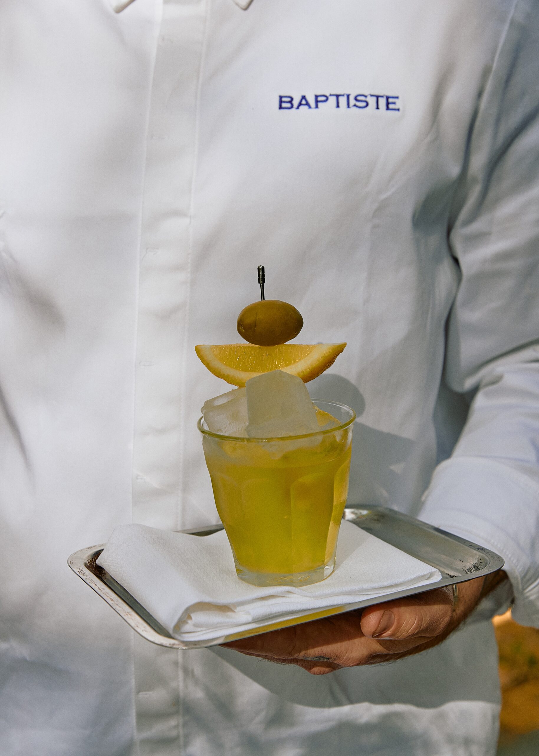 Martini cocktail with olive garnish at Baptiste Redfern Sydney