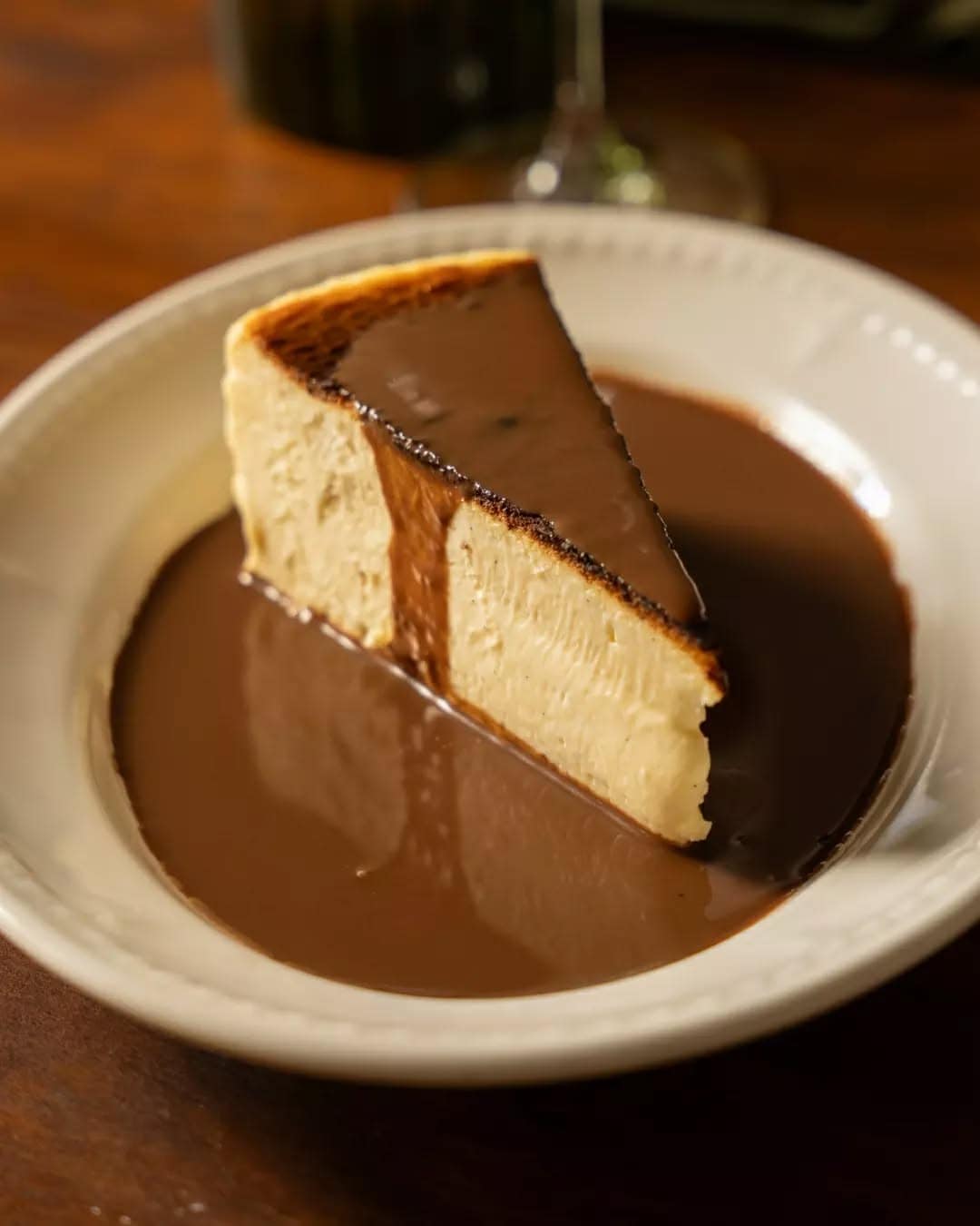 norma fitzroy cheesecake with chocolate sauce