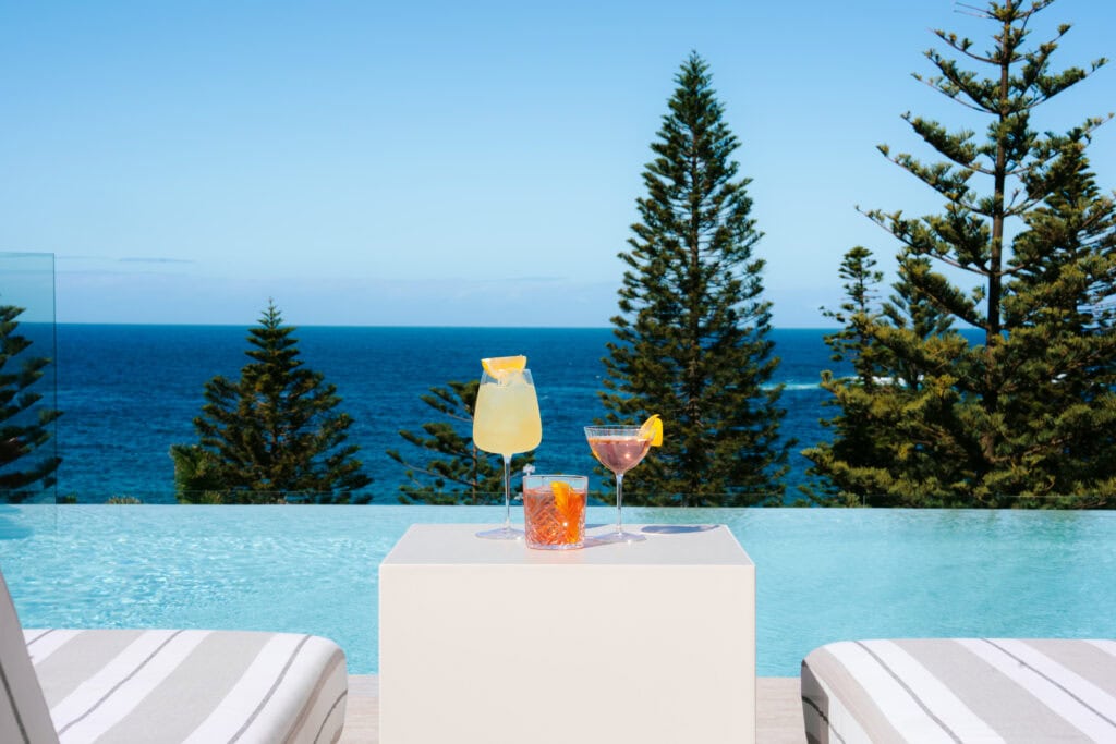 Cocktails beside the ocean-view infinity pool at the InterContinental Sydney Coogee Beach pool bar, Coogee Sydney