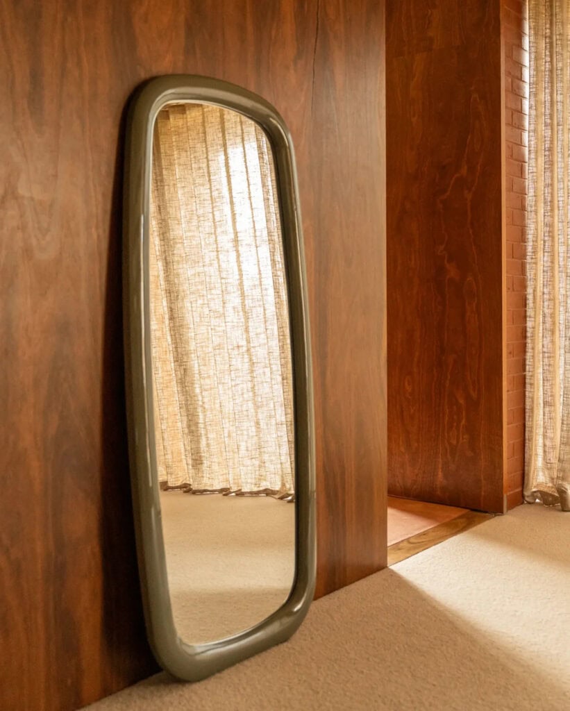 Green frame floor mirror from RJ Living with curved sides