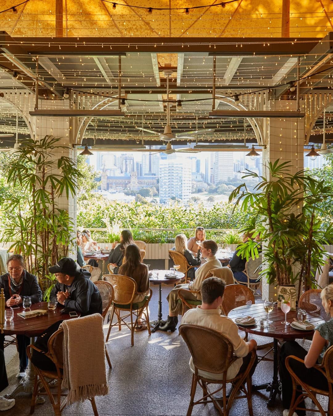 Terrace dining area with city views at The Butler Potts Point Sydney