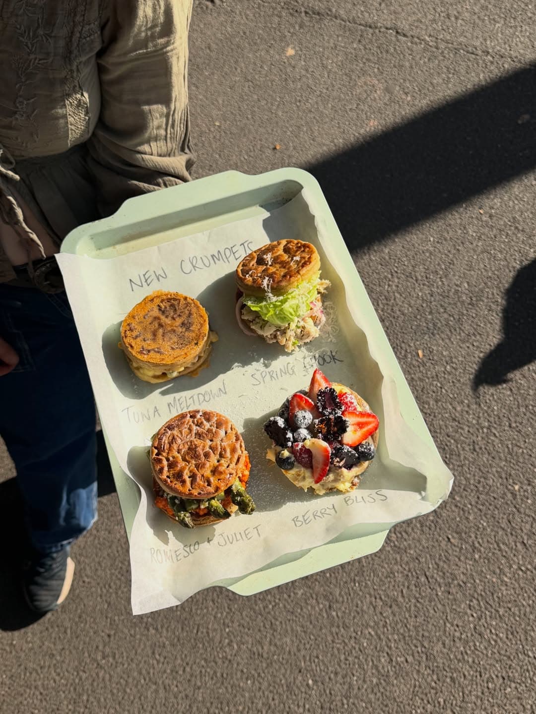 a set of crumpets on a tray at titch cafe in south melbourne