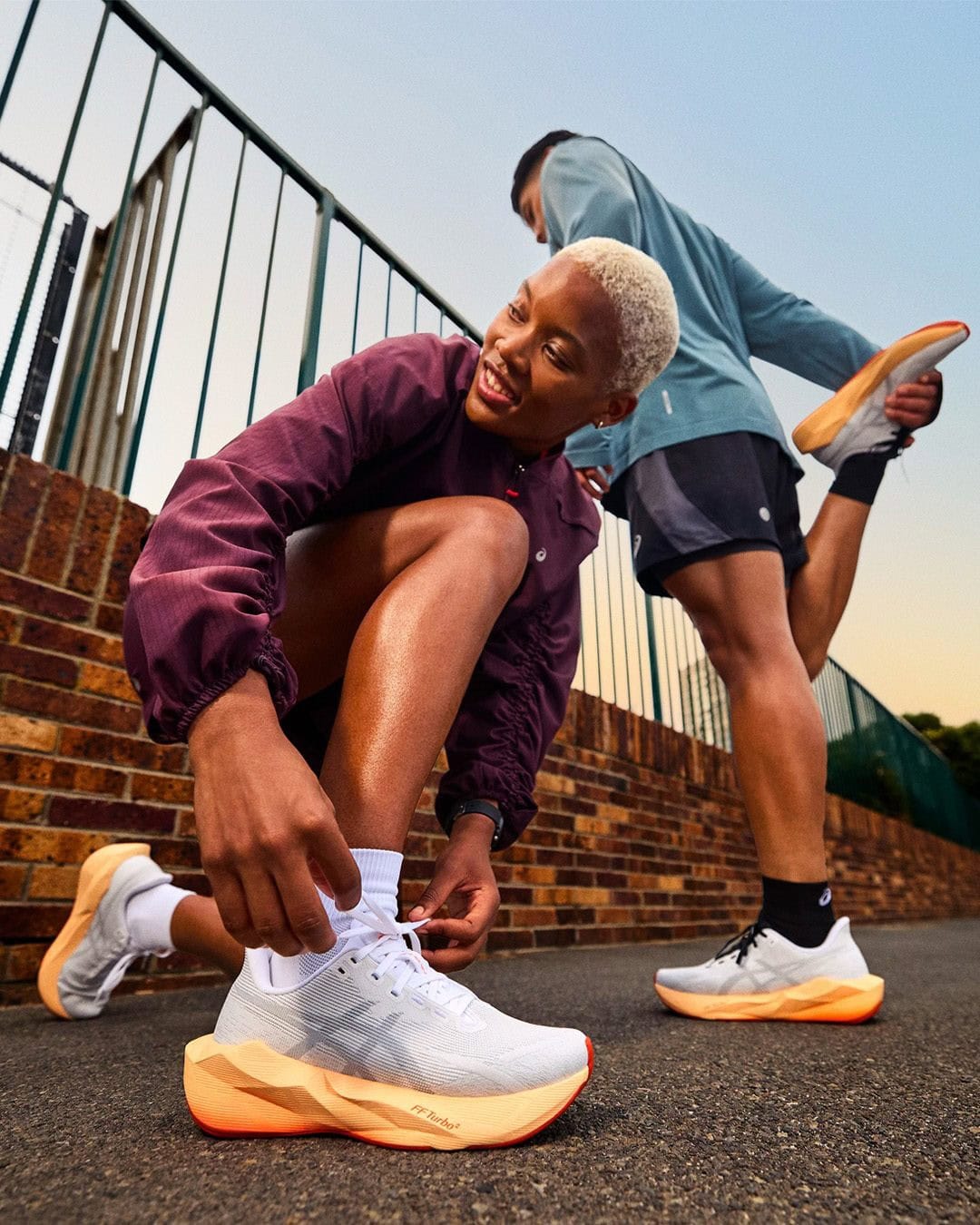 Runners tying ASICS running shoes at The Movement Conservation Project Sydney