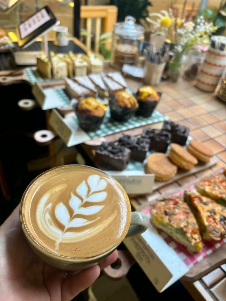 A coffee and display of cakes at HOME at Roto House in Port Macquarie. 