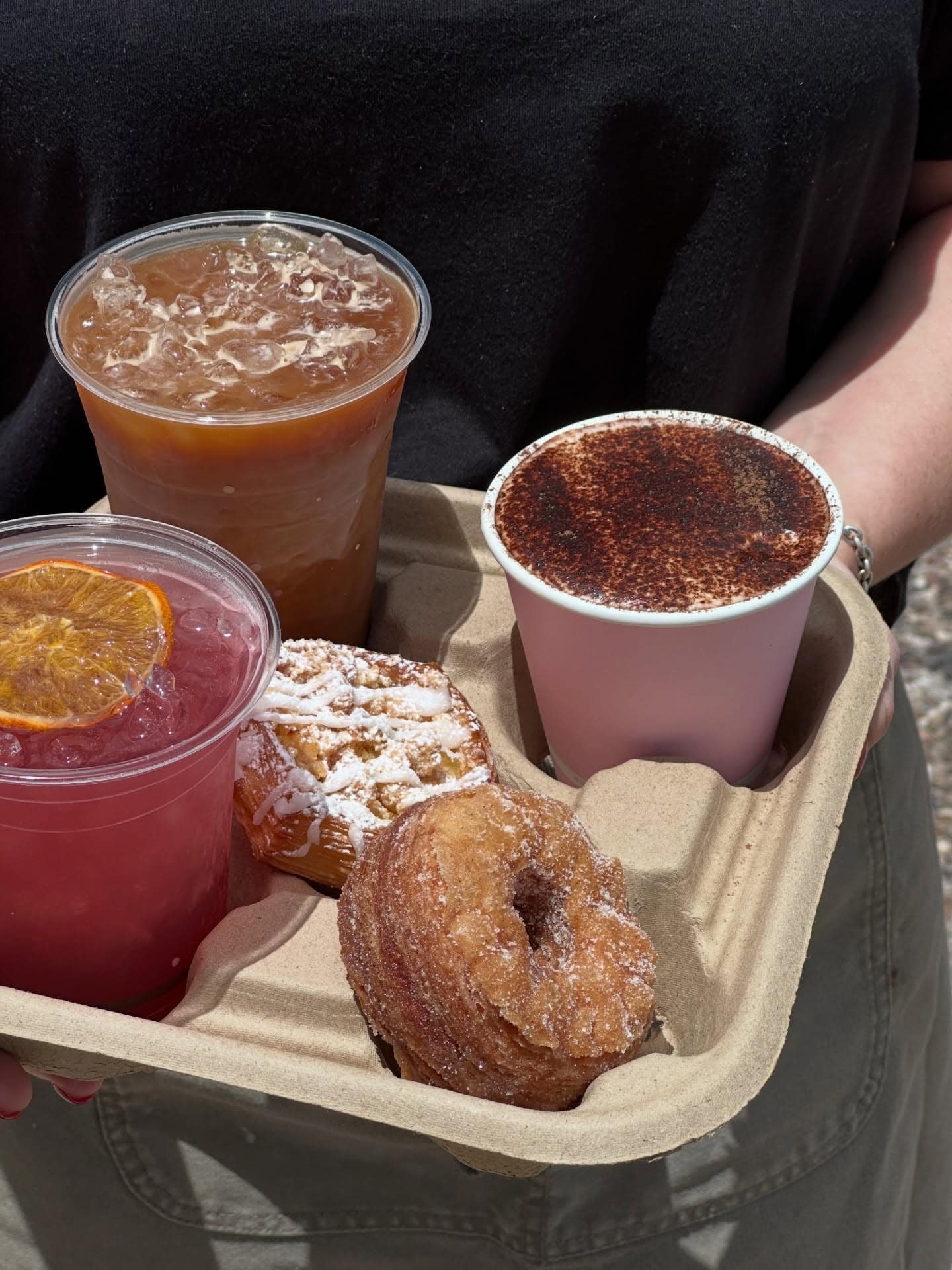 A tray of drinks and a donut from Flour & Chocolate in Morningside.