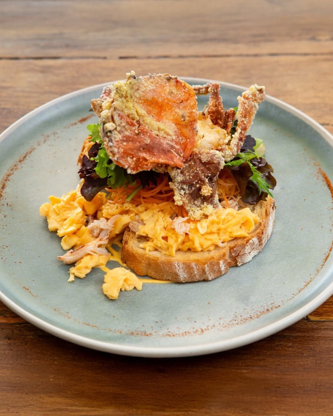 Scrambled eggs with a crab on top from Bloom Cafe in Port Macquarie.