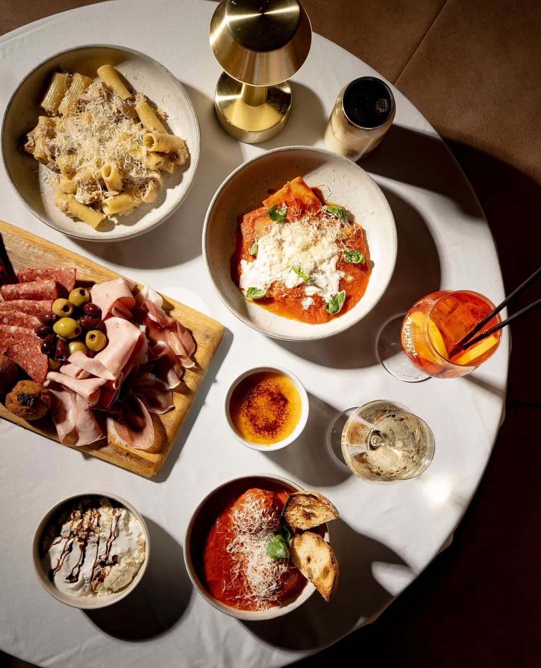 An aerial view of a spread of dishes from The Hills of Rivermakers in Morningside.