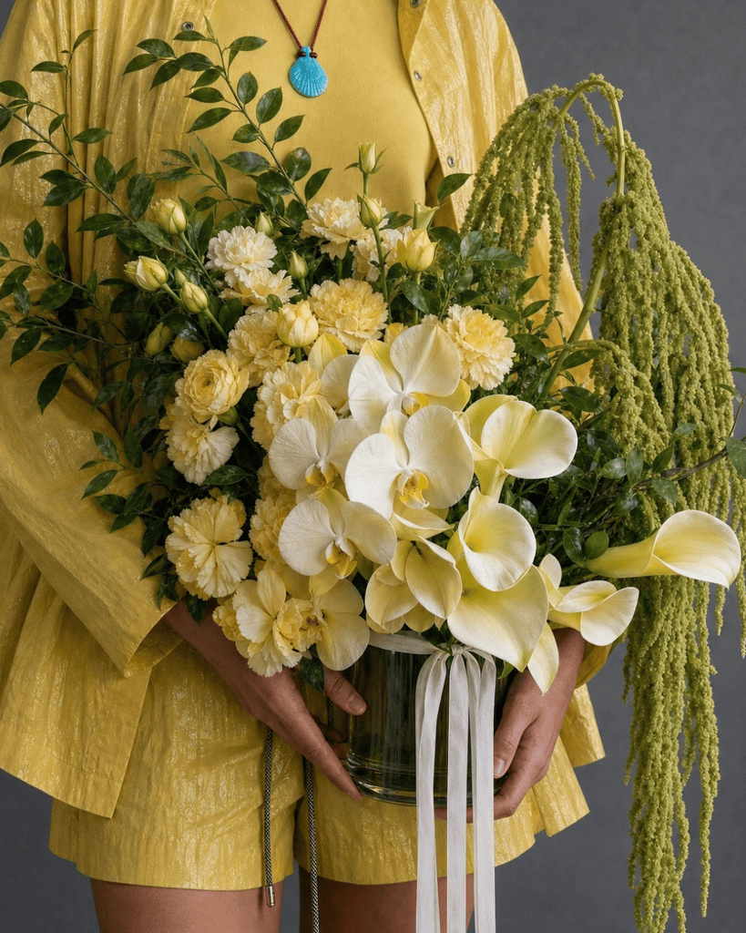 a bunch of yellow flowers from fig & bloom